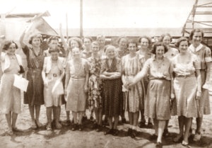 Rabaul Nurses in Manila 1945   — Bowie waving second from left. AWM neg. 19146